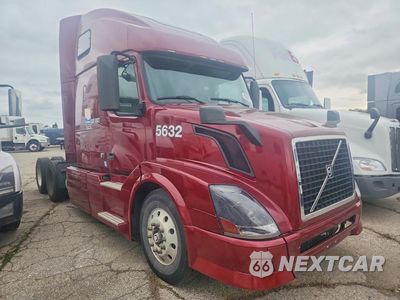 Czwarte zdjęcie samochodu z boku: 2012 VOLVO VNL SEMI TRUCK VIN:4V4NC9TH5CN554116 - miniatura