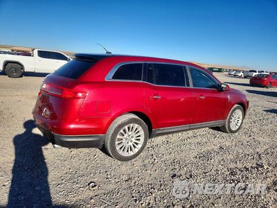 Trzecie zdjęcie samochodu z tyłu: 2014 LINCOLN MKT VIN:2LMHJ5FK7EBL51788 - miniatura