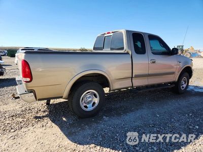 Trzecie zdjęcie samochodu z tyłu: 2000 FORD F150 VIN:1FTRX18L5YKA29131 - miniatura