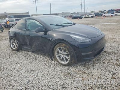 Czwarte zdjęcie samochodu z boku: 2023 TESLA MODEL Y VIN:7SAYGDEE5PA177665 - miniatura