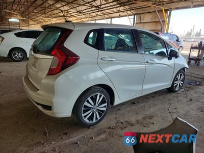Trzecie zdjęcie samochodu z tyłu: 2020 HONDA FIT EX VIN:3HGGK5H83LM703160 - miniatura