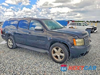 Czwarte zdjęcie samochodu z boku: 2011 CHEVROLET SUBURBAN C1500 LT VIN:1GNSCJE07BR317844 - miniatura