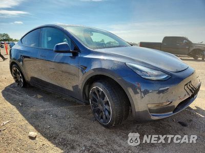 Czwarte zdjęcie samochodu z boku: 2020 TESLA MODEL Y VIN:5YJYGDEE0LF042071 - miniatura