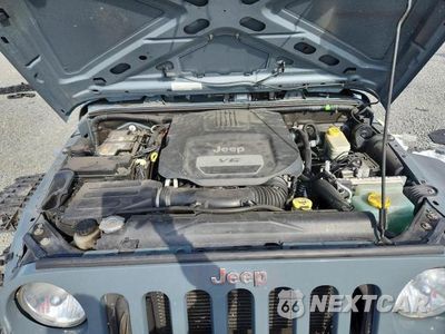 Zdjęcie 11 z 12 samochodu: 2015 JEEP WRANGLER UNLIMITED SPORT VIN:1C4BJWDG3FL588631 - miniatura