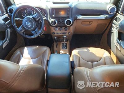 Zdjęcie 8 z 12 samochodu: 2015 JEEP WRANGLER UNLIMITED SAHARA VIN:1C4BJWEG7FL732776 - miniatura
