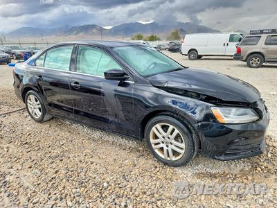 Czwarte zdjęcie samochodu z boku: 2017 VOLKSWAGEN JETTA S VIN:3VW2B7AJ6HM230957 - miniatura