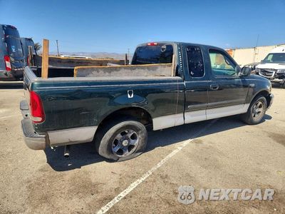 Trzecie zdjęcie samochodu z tyłu: 2001 FORD F150 VIN:1FTZX17241NB50004 - miniatura