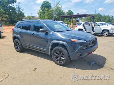 Czwarte zdjęcie samochodu z boku: 2016 JEEP CHEROKEE TRAILHAWK VIN:1C4PJMBS4GW268302 - miniatura