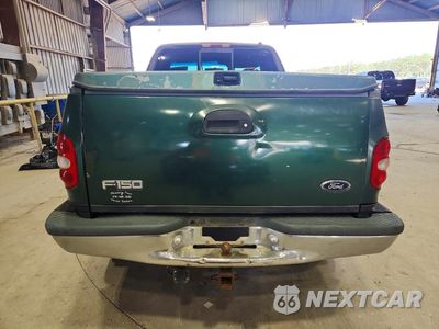 Zdjęcie 6 z 12 samochodu: 1999 FORD F150 VIN:2FTRF08W9XCA16747 - miniatura