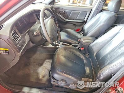 Zdjęcie 7 z 12 samochodu: 2002 HYUNDAI ELANTRA GT VIN:KMHDN55D62U058973 - miniatura