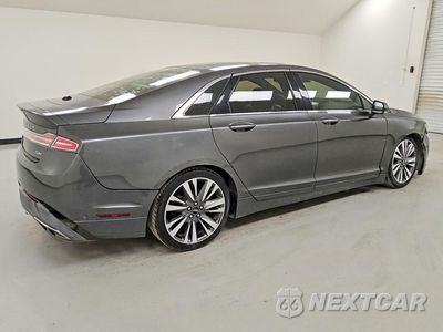Trzecie zdjęcie samochodu z tyłu: 2017 LINCOLN MKZ HYBRID RESERVE VIN:3LN6L5MU7HR641357 - miniatura