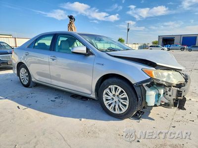 Czwarte zdjęcie samochodu z boku: 2012 TOYOTA CAMRY HYBRID LE VIN:4T1BD1FKXCU018736 - miniatura