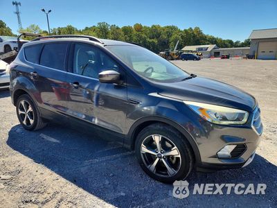 Czwarte zdjęcie samochodu z boku: 2017 FORD ESCAPE SE VIN:1FMCU9G92HUA08322 - miniatura