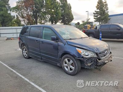 Czwarte zdjęcie samochodu z boku: 2009 VOLKSWAGEN ROUTAN SE VIN:2V8HW34129R599772 - miniatura