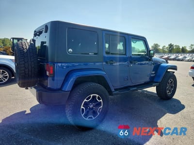 Trzecie zdjęcie samochodu z tyłu: 2009 JEEP WRANGLER UNLIMITED SAHARA VIN:1J8GA591X9L735979 - miniatura