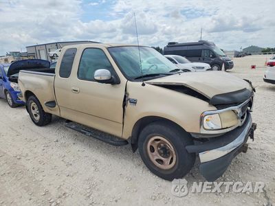 Czwarte zdjęcie samochodu z boku: 1999 FORD F150 VIN:1FTRX07LXXKC01728 - miniatura