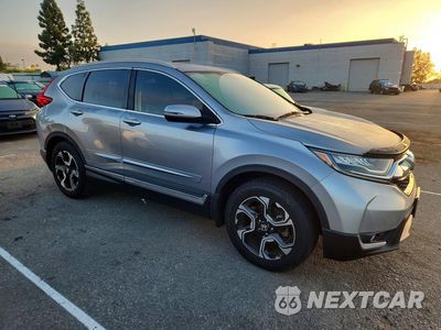 Czwarte zdjęcie samochodu z boku: 2018 HONDA CR-V TOURING VIN:7FARW1H91JE043347 - miniatura