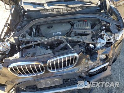 Zdjęcie 12 z 13 samochodu: 2018 BMW X1 XDRIVE28I VIN:WBXHT3C39J5K25851 - miniatura