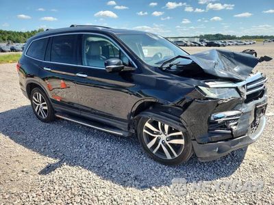 Czwarte zdjęcie samochodu z boku: 2017 HONDA PILOT ELITE VIN:5FNYF6H04HB001139 - miniatura