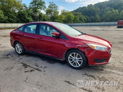 Czwarte zdjęcie samochodu z boku: 2017 FORD FOCUS SE VIN:1FADP3F2XHL346757 - miniatura