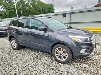 Czwarte zdjęcie samochodu z boku: 2018 FORD ESCAPE SE VIN:1FMCU9GD0JUD38292 - miniatura