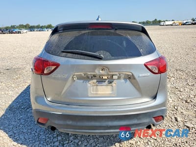 Zdjęcie 6 z 13 samochodu: 2013 MAZDA CX-5 TOURING VIN:JM3KE2CE5D0130611 - miniatura