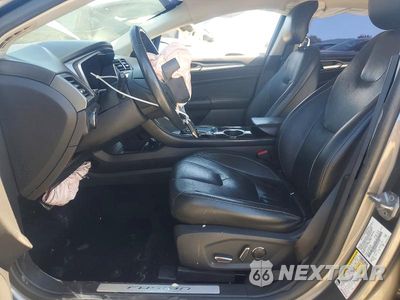 Zdjęcie 7 z 12 samochodu: 2014 FORD FUSION TITANIUM PHEV VIN:3FA6P0SU6ER142498 - miniatura