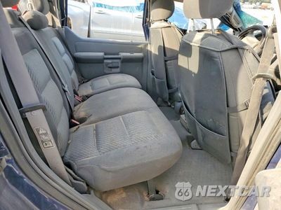 Zdjęcie 10 z 12 samochodu: 2004 FORD EXPLORER SPORT TRAC VIN:1FMZU67K64UA43189 - miniatura