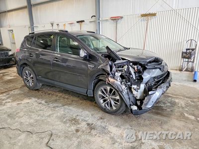 Czwarte zdjęcie samochodu z boku: 2016 TOYOTA RAV4 HV XLE VIN:JTMRJREV4GD037732 - miniatura