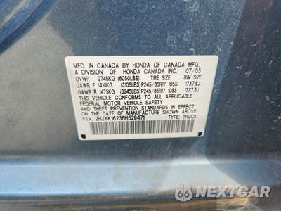 Zdjęcie 12 z 12 samochodu: 2006 HONDA RIDGELINE SPORT VIN:2HJYK16236H529471 - miniatura
