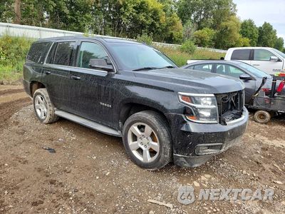 Czwarte zdjęcie samochodu z boku: 2015 CHEVROLET TAHOE K1500 LT VIN:1GNSKBKC1FR221429 - miniatura