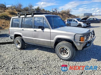Czwarte zdjęcie samochodu z boku: 1991 ISUZU TROOPER VIN:JACCH58E1M8917067 - miniatura