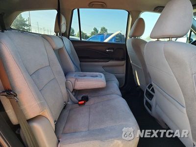 Zdjęcie 11 z 13 samochodu: 2019 HONDA PILOT EX VIN:5FNYF6H33KB068137 - miniatura