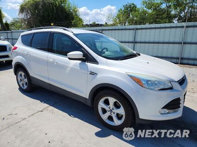 Czwarte zdjęcie samochodu z boku: 2016 FORD ESCAPE SE VIN:1FMCU0GX7GUB06898 - miniatura