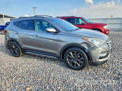 Czwarte zdjęcie samochodu z boku: 2017 HYUNDAI SANTA FE SPORT 2.0T ULTIMATE VIN:5XYZWDLA1HG494716 - miniatura
