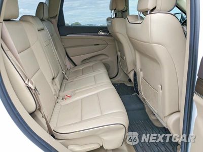 Zdjęcie 11 z 13 samochodu: 2014 JEEP GRAND CHEROKEE OVERLAND VIN:1C4RJFCT6EC417545 - miniatura