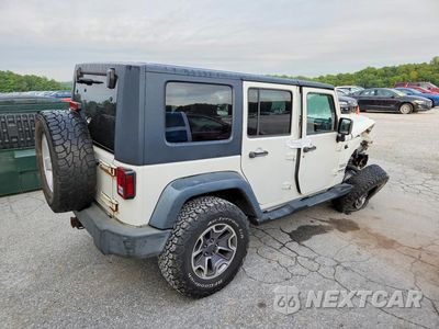 Trzecie zdjęcie samochodu z tyłu: 2010 JEEP WRANGLER UNLIMITED SPORT VIN:1J4BA3H19AL105022 - miniatura