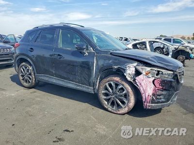 Czwarte zdjęcie samochodu z boku: 2016 MAZDA CX-5 GT VIN:JM3KE4DY2G0791201 - miniatura