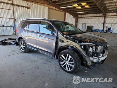 Czwarte zdjęcie samochodu z boku: 2018 HONDA PILOT TOURING VIN:5FNYF6H95JB034798 - miniatura