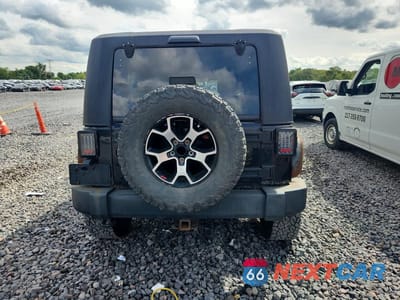Zdjęcie 6 z 12 samochodu: 2014 JEEP WRANGLER UNLIMITED RUBICON VIN:1C4BJWFG7EL145104 - miniatura