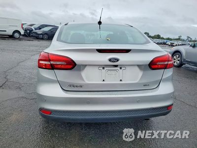 Zdjęcie 6 z 13 samochodu: 2017 FORD FOCUS SEL VIN:1FADP3H27HL312823 - miniatura