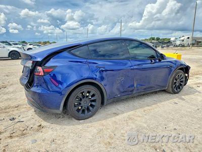 Trzecie zdjęcie samochodu z tyłu: 2023 TESLA MODEL Y VIN:7SAYGDEE5PA100262 - miniatura
