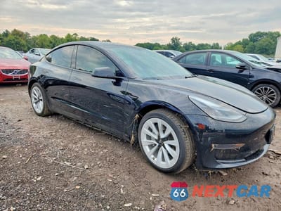 Czwarte zdjęcie samochodu z boku: 2023 TESLA MODEL 3 VIN:5YJ3E1EA1PF680833 - miniatura