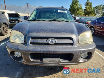 Piąte zdjęcie samochodu w środku: 2005 HYUNDAI SANTA FE GLS VIN:KM8SC13D05U874557 - miniatura