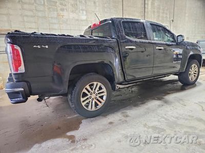 Trzecie zdjęcie samochodu z tyłu: 2015 GMC CANYON SLT VIN:1GTG6CE39F1251989 - miniatura