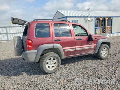 Trzecie zdjęcie samochodu z tyłu: 2003 JEEP LIBERTY SPORT VIN:1J4GL48K23W594606 - miniatura