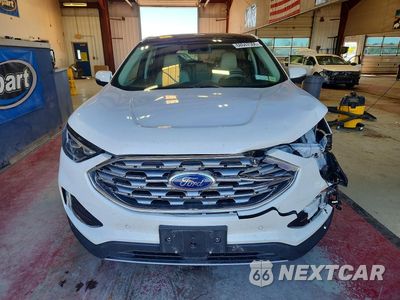 Piąte zdjęcie samochodu w środku: 2020 FORD EDGE TITANIUM VIN:2FMPK4K98LBA53409 - miniatura