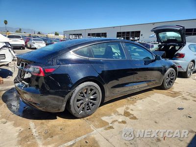 Trzecie zdjęcie samochodu z tyłu: 2022 TESLA MODEL 3 VIN:5YJ3E1EB1NF287274 - miniatura