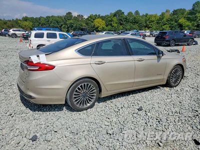 Trzecie zdjęcie samochodu z tyłu: 2017 FORD FUSION SE HYBRID VIN:3FA6P0LU3HR226507 - miniatura