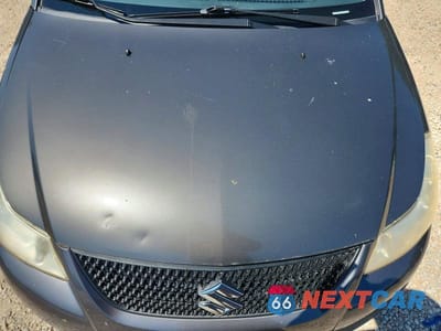 Zdjęcie 11 z 12 samochodu: 2012 SUZUKI SX4 LE VIN:JS2YC5A32C6300677 - miniatura